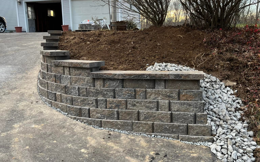 What Is the Purpose of a Retaining Wall in My Yard?
